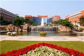 A park and fountain in front of the Changchun Campus